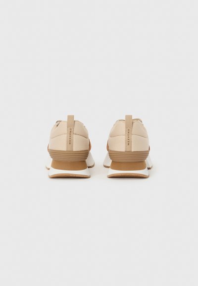 Beige sneakers with a textured fabric upper, white sole, and brown rubber heel; features a looped heel tab with "WEEKEND" text.