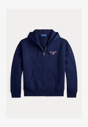 Hanorac bleumarin cu fermoar, confecționat dintr-un material moale. Are un buzunar frontal, glugă cu șnur și un mic logo "Polo Sport" pe partea stângă a pieptului.