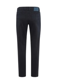 Zwarte jeans met een slim fit, vijf zakken en een logo patch op de achterkant. Gemaakt van denim met een zachte textuur en recht afgewerkte pijpen.