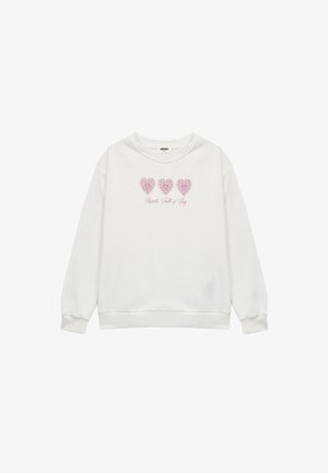 White sweatshirt with long sleeves, rounded neckline, featuring three pink heart designs and the text “Hearts Full of Joy” below.
