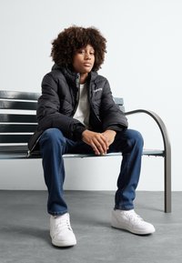 Levi's® CORE PUFFER - Vinterjacka - black