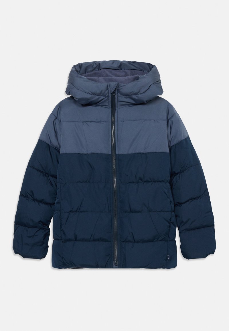 Veste matelassée bicolore bleu marine avec fermeture éclair à l'avant et capuche intégrée, conçue pour les temps froids.