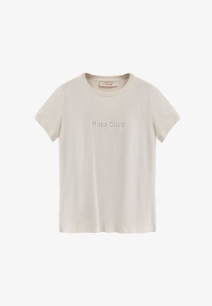 Lys beige bomulds T-shirt med korte ærmer og rund halsudskæring. "Polo Club" tekst i diskret pynt på brystet. Blød tekstur.