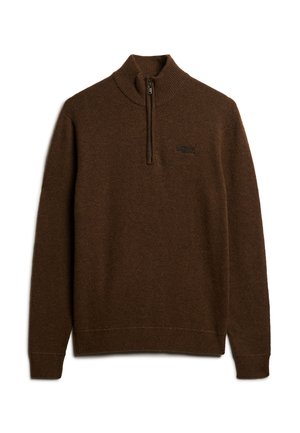 Bruine zip-neksweater van gestructureerde stof. Beschikt over een geribde kraag en manchetten. Kleine logo-detail dicht bij de hals.
