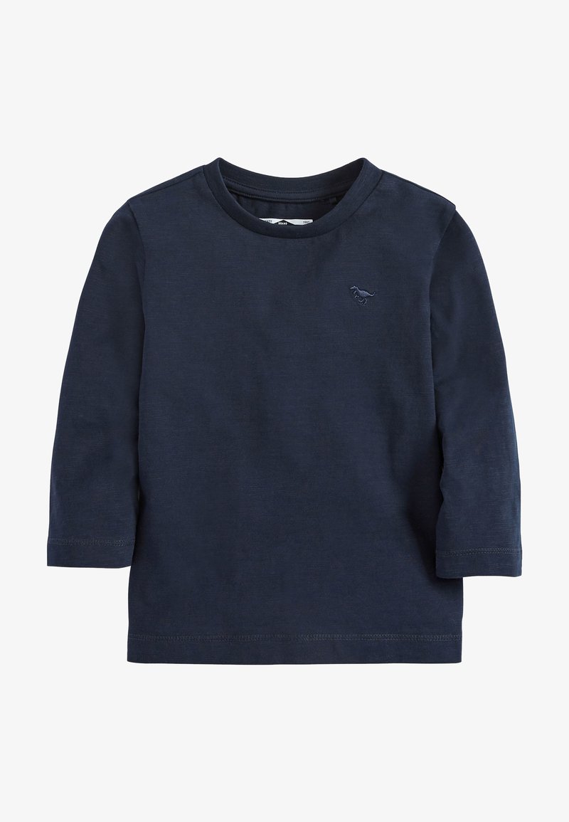 Jūras spēku garās piedurknes t-krekls, kas izgatavots no mīkstas auduma, ar apaļu kakla izgriezumu un smalku izšūtu logotipu uz krūtīm. Apakšmalai un piedurknēm ir šūti aksesuāri.