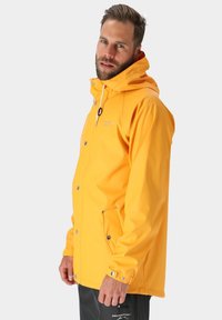 Swedemount VÄDERÖARNA - Regenjas - mustard yellow