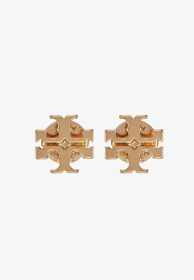 Ohrringe mit goldfarbener Beschichtung, die ein geometrisches Kreuzdesign mit abgerundeten Kanten und kleinen kreisförmigen Akzenten aufweisen. Glatte, glänzende Metalloberfläche.
