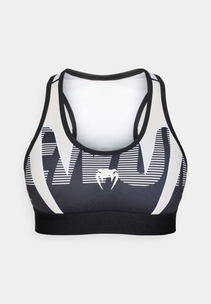 Sport-BH mit einem schwarz-weiß gestreiften Design und einem Logo. Hergestellt aus dehnbarem Stoff mit sportlichem Racerback und einem elastischen Bund.