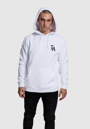 White sweatshirt with a hood, featuring a front pocket and a black "LA" logo. Made from soft fabric, with a relaxed fit and ribbed cuffs.