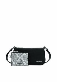 Black leather crossbody bag with zip closure, featuring a small detachable wallet in snake print pattern, branded "Desigual." on the front.