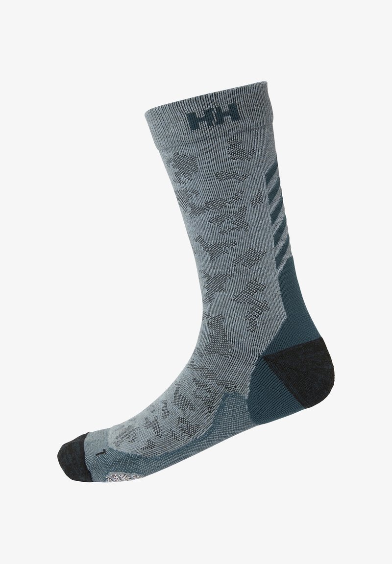 Calcetín gris con patrón azul oscuro, que presenta un diseño texturizado, puño acanalado, talón reforzado y punta reforzada para mayor durabilidad.