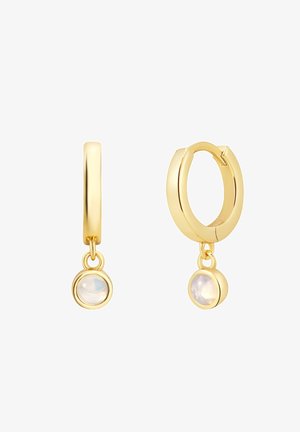 Gold hoop earrings with a smooth finish, featuring dangling round opalescent stones. The design is minimalistic and circular in shape.