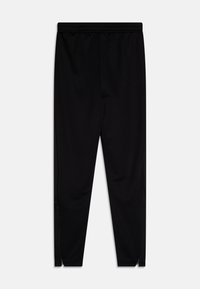 Nike Performance ACADEMY 23 PANT BRANDED UNISEX - Pantalones deportivos - black