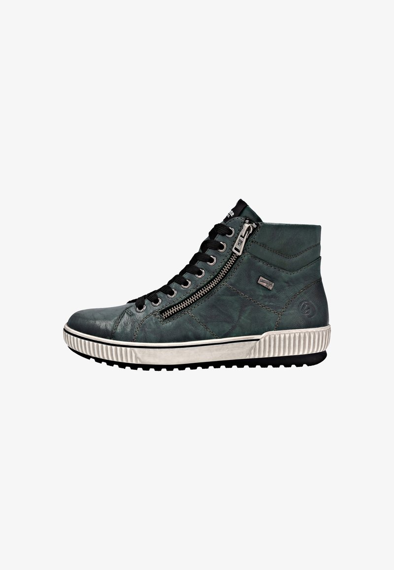 Baskets montantes en cuir verde foncé avec une finition texturée, lacets noirs, fermeture éclair sur le côté et semelle en caoutchouc blanche avec des accents nervurés.
