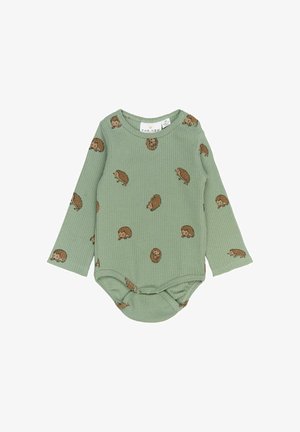 Langwerpige bodysuit in gedempt groene ribstof, versierd met een egelprint. Voorzien van drukknoopsluitingen onderaan voor gemakkelijk aankleden.
