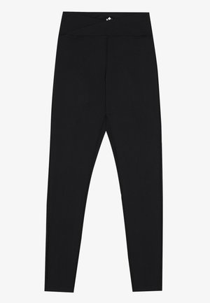 Sorte leggings laget av elastisk stoff, med en bred, krysset midjebånd. Designet er sømløst med en tettsittende silhuett.