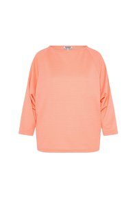 Korallenrosa Langarmtop mit rundem Ausschnitt, ausgestattet mit einem gerippten Textur und einem lockeren Schnitt mit raglanärmel und weiten Ärmeln.