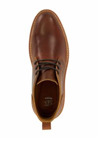 Brown leather boot with dark laces, smooth finish, contrasting sole stitching, and a pull-tab at the back for easy wear.