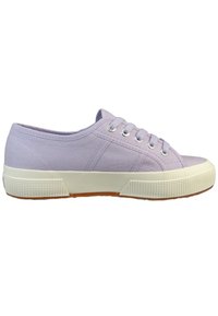 Light purple canvas sneakers with white rubber soles, round toe, six eyelets, and textured side panels.