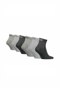 Six pairs of crew socks in varying shades of gray, featuring a ribbed top and subtle branding. Made of soft cotton blend material.