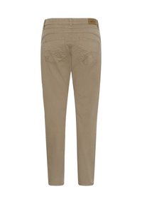 Pantalons slim beige en tissu doux, dotés de deux poches arrière avec une couture décorative et d'une taille mi-haute.