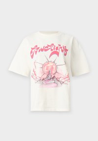 Cream-colored cotton t-shirt featuring a graphic design with a sun, mountain, and swirling path in pink and gray tones. Short sleeves.