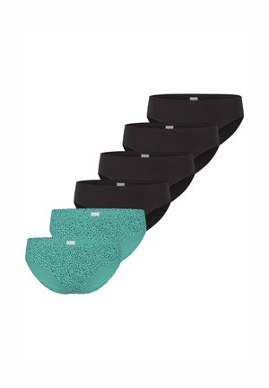 Fünf Paare Damenunterhosen: drei schwarze in glattem Stoff, zwei teal mit gepunktetem Muster, alle tief geschnitten mit breiten elastischen Bündchen.