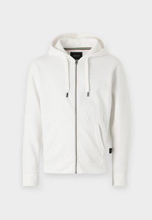 Witte zip-up hoodie gemaakt van zachte stof, met een capuchon met trekkoorden, twee voorzakken en een klein logo op de borst.