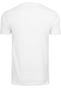 Hvid kortermet t-shirt med rund halsudskæring, lavet af bomuld. Har et ensfarvet design uden mønstre eller detaljer. Bagudsigten.