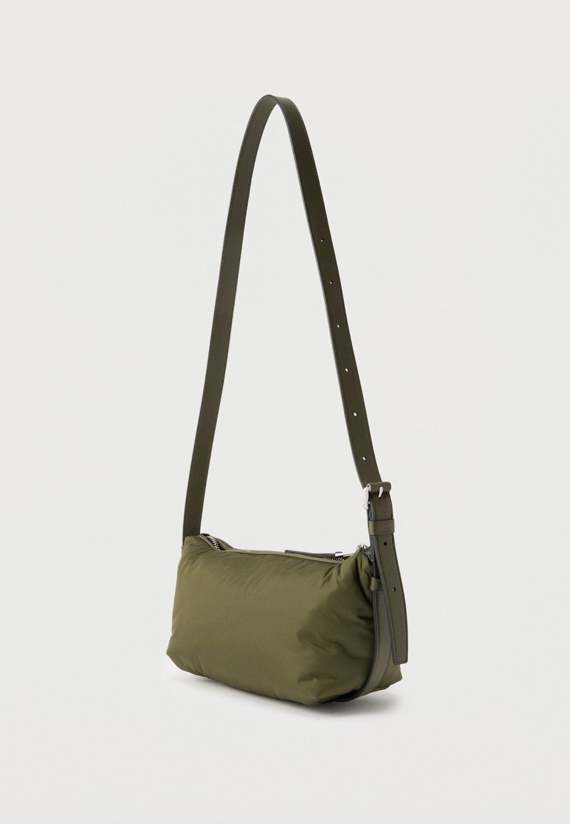 Olive green shoulder bag with adjustable strap and zipper closure, displayed upright on a plain light background.