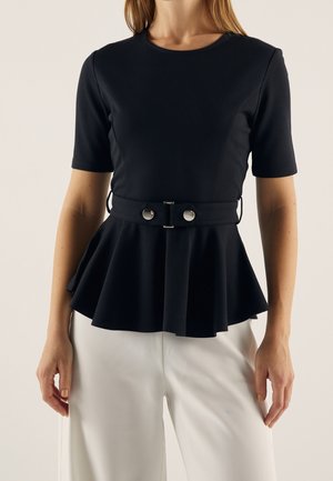 Black peplum top made of soft fabric, featuring a round neckline, short sleeves, and a belted waist with silver hardware accents.
