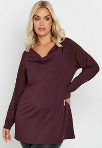 Långärmad topp i mörk burgunder, gjord av mjukt tyg, med en draperad cowl-krage och sidofickor, i avslappnad passform och med rundad nederkant.