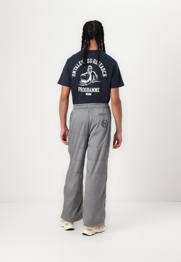 F1 T7 OVERSIZED TRACK PANTS - Tracksuit bottoms - team silver3