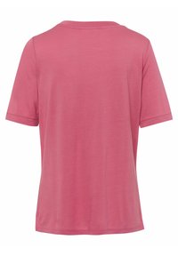 T-shirt à manches courtes couleur rose poussiéreux uni avec col rond, vu de dos sur fond blanc.