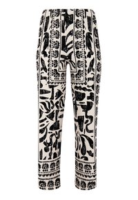 Un pantalon à motifs noir et blanc avec une taille élastique, une coupe droite et des motifs abstraits audacieux agrémentés d'accents floraux.