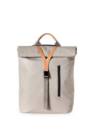 Beige roll-top backpack with tan leather strap, front vertical zipper pocket, and black buckle closure.