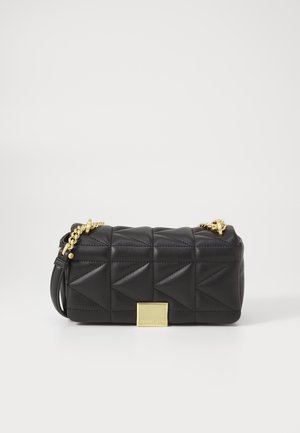 Black quilted leather handbag with gold-tone chain strap, rectangular shape, and a square gold hardware accent on the front.