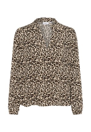 Blus med lång ärm i leopardmönster och v-ringning, lätt tyg och samlade manschetter. Har tan- och mörkbruna leopardfläckar på krämfärgad bakgrund.