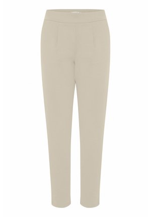 Beige pants made of soft fabric, featuring a smooth texture, tapered legs, and side pleats, with an elastic waistband for comfort.