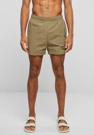 Khaki Schwimmshorts aus leichtem Material, mit elastischem Bund, Seitentaschen und einem minimalistischen Design.