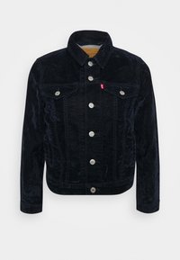 Giubbotto in denim nero con una finitura testurizzata, dotato di bottoni argentati, due tasche sul petto e colletto a punta. Design classico.