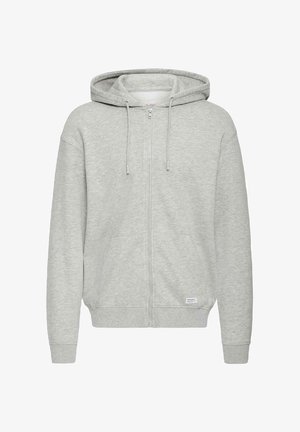 Vista frontale di una felpa con cappuccio, chiusura a zip, di colore grigio chiaro, caratterizzata da una texture liscia, con coulisse e tasche laterali.