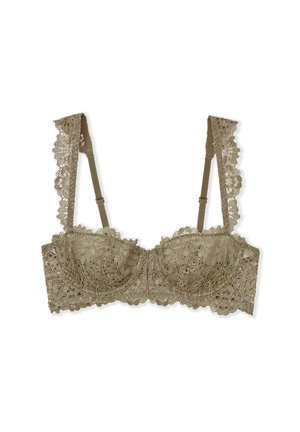 Lace bra in light beige featuring decorative scalloped edges, intricate floral patterns, and adjustable straps for a customized fit.