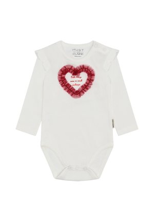 Body neonato bianco a maniche lunghe con spalline arruffate, caratterizzato da un contorno a forma di cuore rosso e la scritta "Le cose belle arrivano in piccoli pacchetti."
