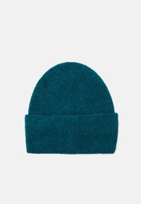 Gorro en color azul verdoso hecho de lana suave y texturizada, con un puño doblado y un diseño de parte superior redondeada, apto para un uso casual.