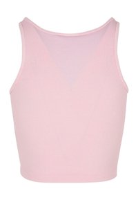 Geribbelde crop top in lichtroze, met een ronde halslijn en brede schouderbanden. Zacht textiel met een aansluitend ontwerp.