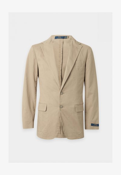 Beige blazer med to knapper, hakkede revers, forlommer med klap, brystlomme og Polo Ralph Lauren-mærke på ærmet og indersiden af kraven.