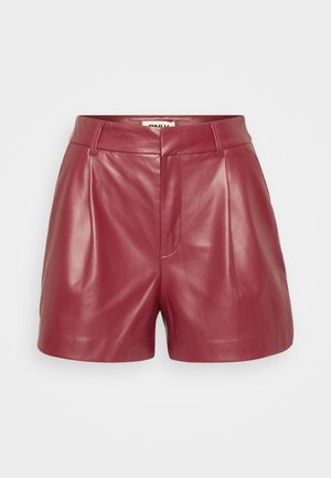 Red leather shorts featuring a high waist, pleats, and smooth texture. The design is tailored with a clean silhouette and no visible hardware.