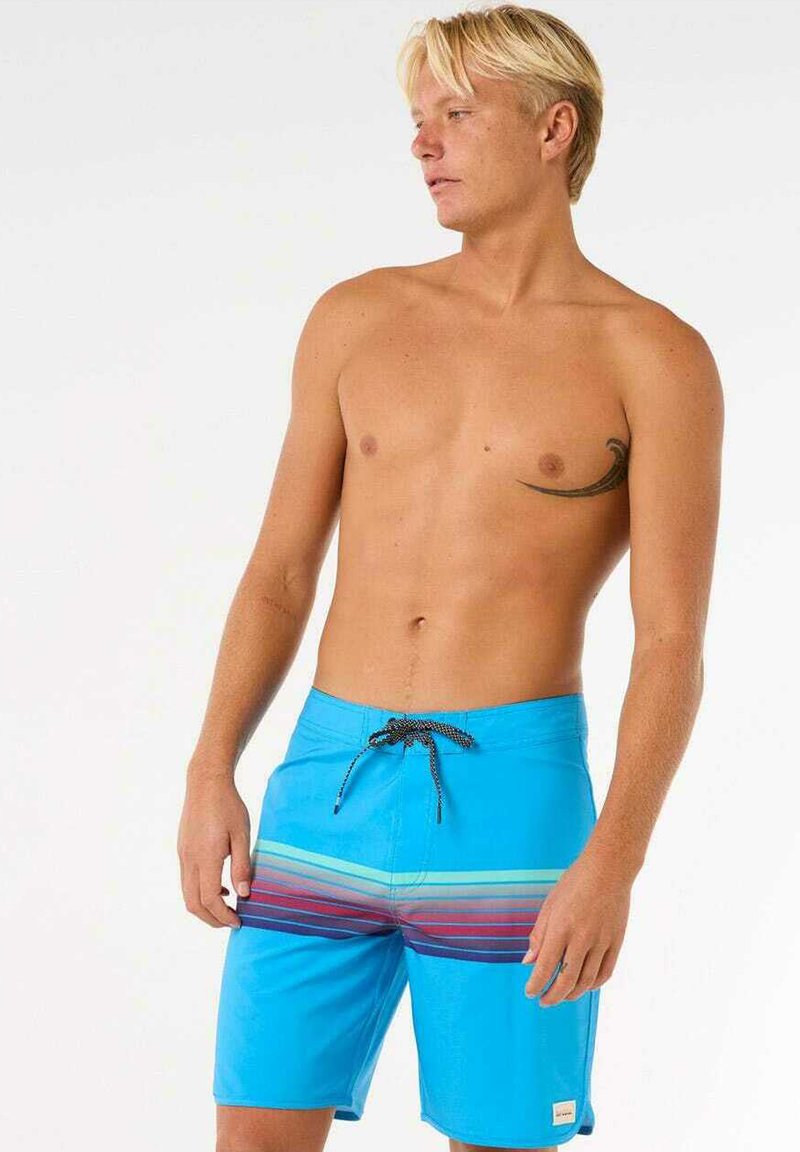 Pantaloni da bagno blu realizzati in un materiale leggero, con un motivo a righe orizzontali multicolore e una vita con cordoncino nero.