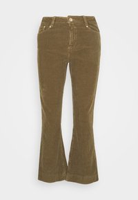 Pantalons en velours côtelé vert olive à taille haute, avec fermeture par bouton sur le devant et zip, et jambes légèrement évasées.